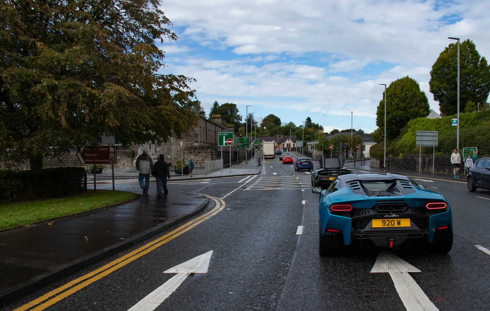 The blue McLaren leading the Run 4 Eoin 2026 convoy through town
